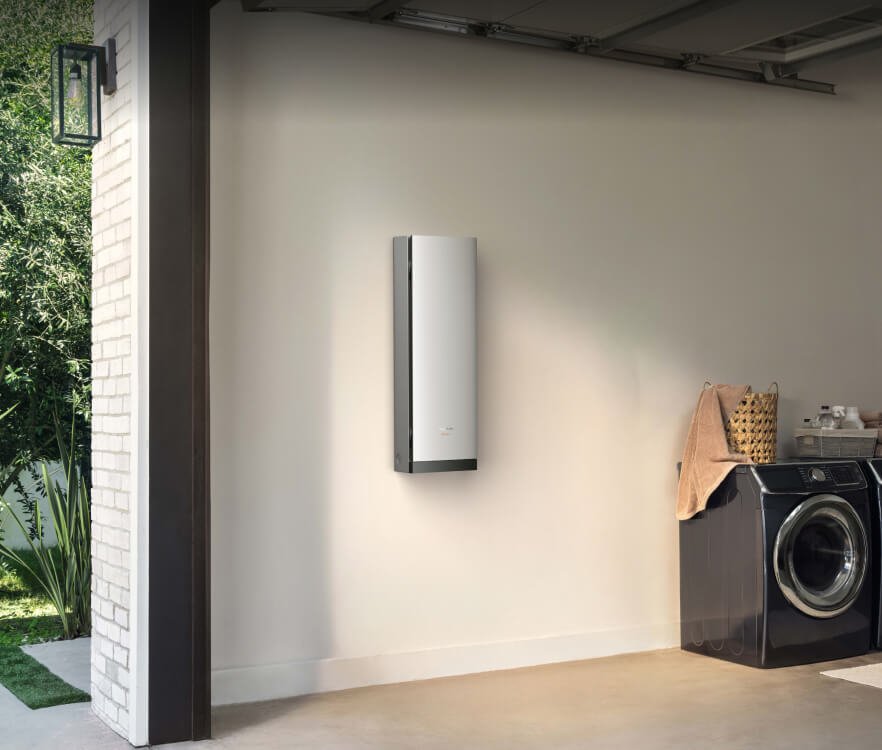 How a Home Safe Room Is Built: Ballistic Walls, Clean Air, and Backup Power Smart home backup power panel installed on a garage wall